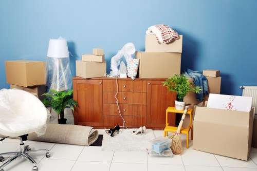 Local office moving team preparing equipment for transport
