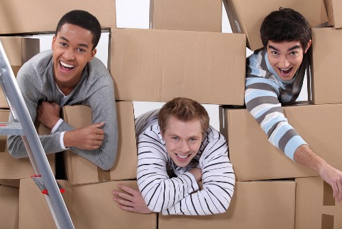 Office removals team preparing equipment for a Whitechapel business move