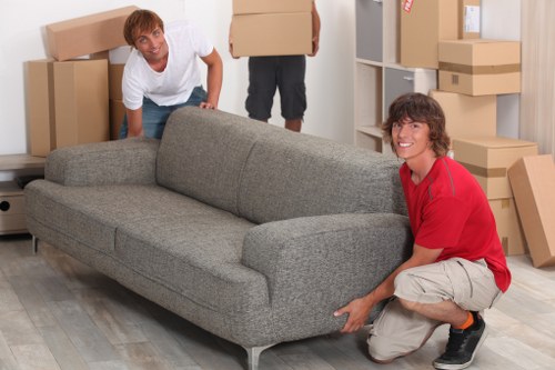 Local movers loading items for removals in Whitechapel