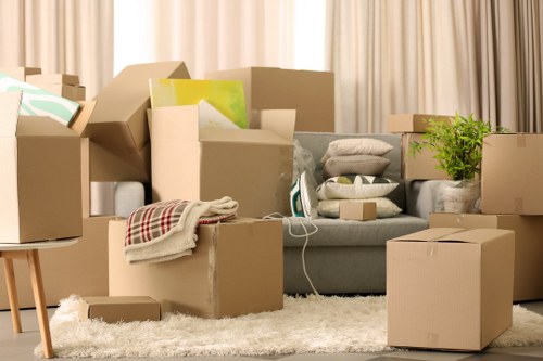 Professional movers loading boxes for a flat move in Whitechapel
