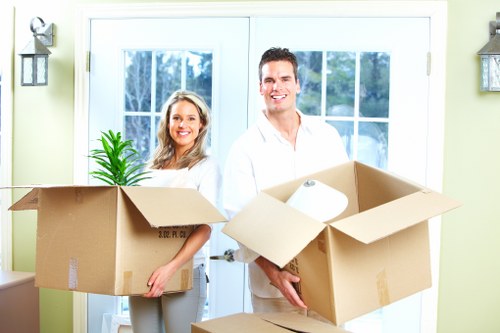 Packing and loading furniture into a moving van in Whitechapel